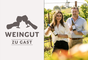 Weingut zu Gast Lobner Mann und junge Frau rechts im Bild mit Weinflasche in Hand