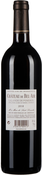 Dunkelrote Weinflasche mit elegantem Etikett, Bordeaux-Stil.