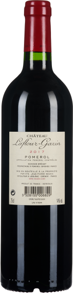 Eine Flasche Rotwein mit rotem Korken und elegantem Etikett.