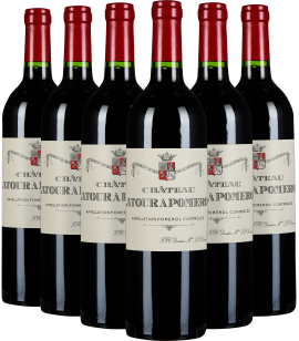 Sechs Weinflaschen mit roten Kapseln und cremefarbenen Etiketten, elegant präsentiert.