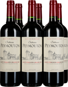 Sechs Flaschen Rotwein mit elegantem Etikett und roten Kapseln.