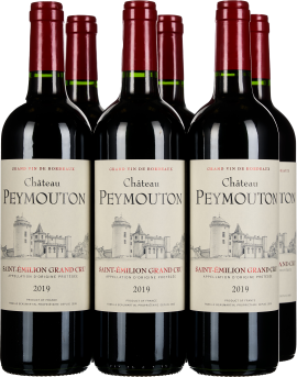 Sechs Bordeaux-Weinflaschen mit rotem Verschluss und klassischem Château-Etikett.