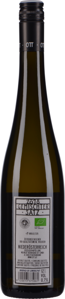 Schlanke Weinflasche mit schwarzem Schraubverschluss und elegantem Etikett.