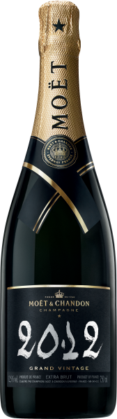 Dunkle Champagnerflasche mit goldener Folie und eleganter Beschriftung.