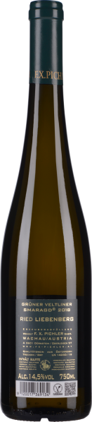 Schlanke Weinflasche mit dunkelgrünem Etikett und schimmerndem, goldfarbenem Text.