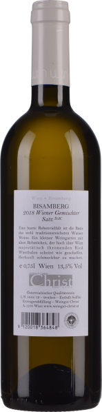 Grüne Weinflasche mit weißem Etikett, klarer Verschluss, elegantes Design.