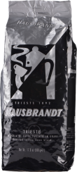 Silberne Verpackung mit schwarzem Logo und grafischer Kaffeetasse.