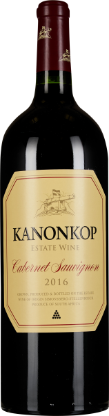 Dunkle Weinflasche mit rotem und goldfarbenem Etikett.