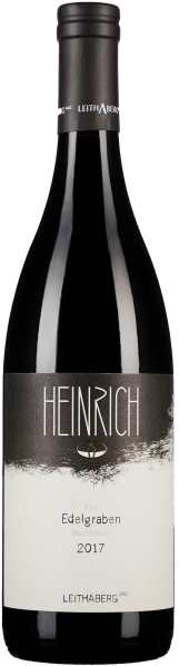 Dunkle Weinflasche mit elegantem schwarz-weißem Etikett und modernem Schriftzug.