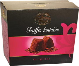 Schwarze Verpackung mit Trüffelabbildung, pinker Akzentgrafik und verschnörkeltem Schriftzug.