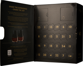Schwarzer Adventskalender mit goldenen Zahlen und zwei Gläsern auf der Innenseite.