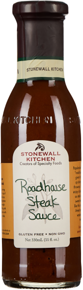 Braune steak sauce in Glasflasche mit braunem Deckel und cremefarbenem Etikett.