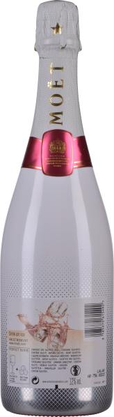 Weiße Champagnerflasche mit goldener Schrift und rotem Etikett.