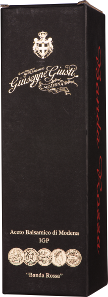 Schwarze Balsamico-Verpackung mit goldener und roter Schriftverzierung.