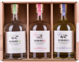 Dreier-Set von Wacholderbär Gin in Glasflaschen mit individuell gestalteten Etiketten.