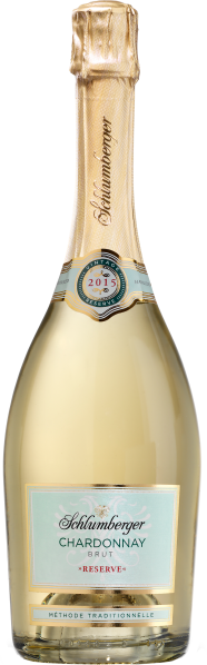 Goldene Sektflasche mit eleganter Etikettierung.