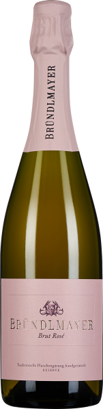 Flasche mit rosa Etikett und roséfarbenem Folienhals, elegante Erscheinung.