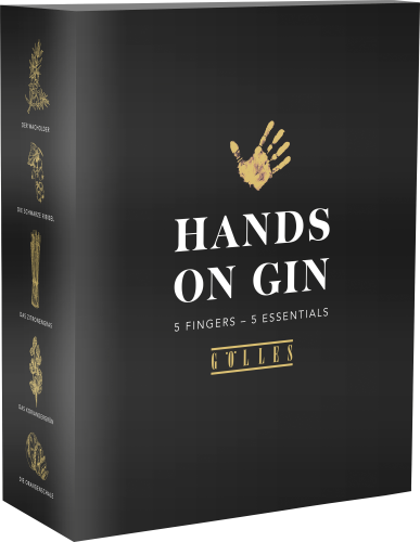 Schwarze Verpackung mit goldener Hand und botanischen Illustrationen seitlich.