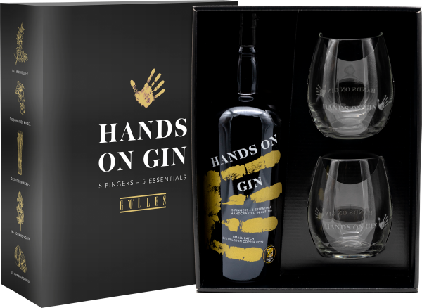 Geschenkset mit schwarzer Gin-Flasche und zwei schlichten Gläsern in eleganter Box.