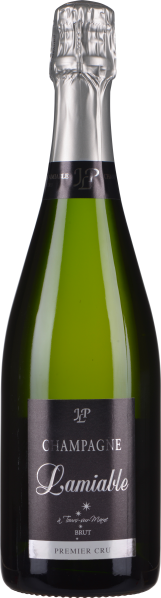 Grüne Champagnerflasche mit silberner Kapsel und schwarzem Etikett.
