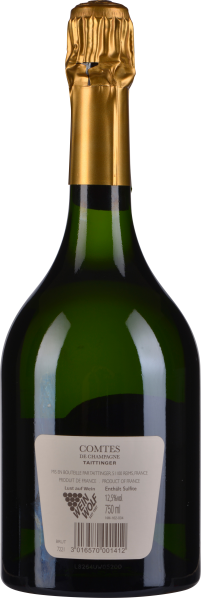 Grüne Weinflasche mit goldener Folie um den Korken, Etikett sichtbar.