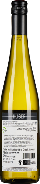 Gelbeweinflasche mit schwarzem Schraubverschluss und weißem Etikett auf der Rückseite.