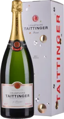 Eine große Champagnerflasche mit goldener Folie auf dem Korken, in einer eleganten Geschenkbox mit glänzenden Verzierungen.