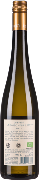 Grüne Weinflasche mit goldenem Schraubverschluss und cremefarbenem Etikett.