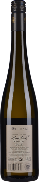 Braune Weinflasche mit schwarzer Kapsel und beigem Etikett.