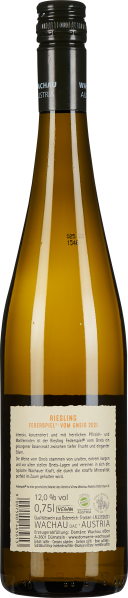 Transparente Weinflasche mit gold-gelbem Inhalt und schwarzem Schraubverschluss.