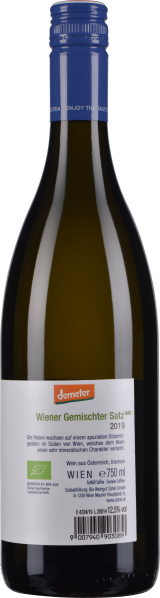 Braune Weinflasche mit blauem Schraubverschluss und weißem Etikett.