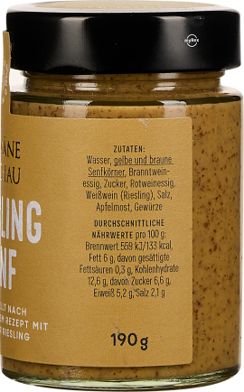 Gelbes Senfglas mit schwarzem Deckel und detaillierter Zutatenliste auf dem Etikett.