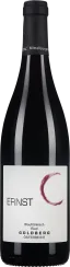 Die Flasche zeigt einen eleganten Rotwein mit einer tiefen, dunklen Farbe. Das Etikett ist schlicht in Weiß gehalten, mit einem künstlerischen roten Halbkreis und schwarzem Text. Der Verschluss ist schwarz.