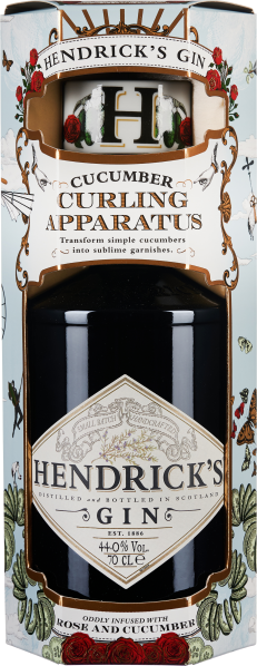 Flasche in dekorativer Geschenkverpackung mit floralen Elementen und viktorianischem Design.