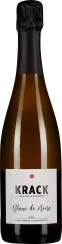 Eine elegante Sektflasche mit dunkler, glänzender Oberfläche, schwarzem Folienverschluss und schlichtem, modernem Etikett.