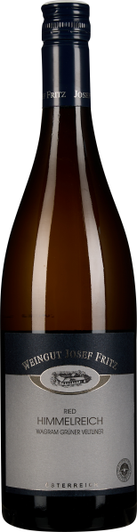 Braune Weinflasche mit dunkelblauem Etikett und silbernen Details.