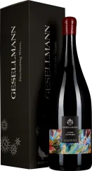 Weinflasche mit rotem Siegel, bunter Etikettendesign, schwarzer Geschenkkarton.