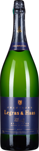 Grüne Champagnerflasche mit dunkelblau-goldenem Etikett und Verschluss.