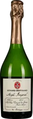 Grüne Sektflasche mit goldener Folie und elegantem Etikett.