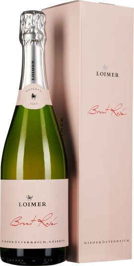Eine elegante Sektflasche in hellrosa Etikettierung mit silberner Folie am Flaschenhals, neben einer passenden rosa Verpackung.