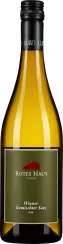 Eine Weinflasche mit einem dunklen Schraubverschluss. Etikett in Olivgrün mit einem roten Logo. Die Flasche enthält eine klare, gelbliche Flüssigkeit.