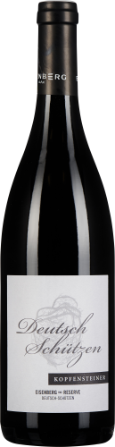 Dunkle Weinflasche mit mattem schwarzen Etikett, darauf elegante weiße und silberne Schrift sowie ein stilisiertes Bild von Weintrauben. Der Flaschenhals ist ebenfalls schwarz.