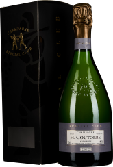 Champagnerflasche mit goldener Folie, Gravur und dunkler Geschenkbox.