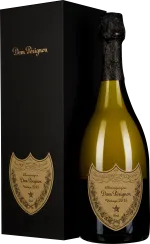 Champagnerflasche mit goldfarbenem Etikett neben schwarzer Geschenkbox.