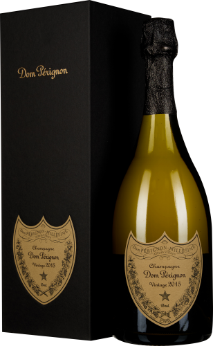 Champagnerflasche mit goldfarbenem Etikett neben schwarzer Geschenkbox.